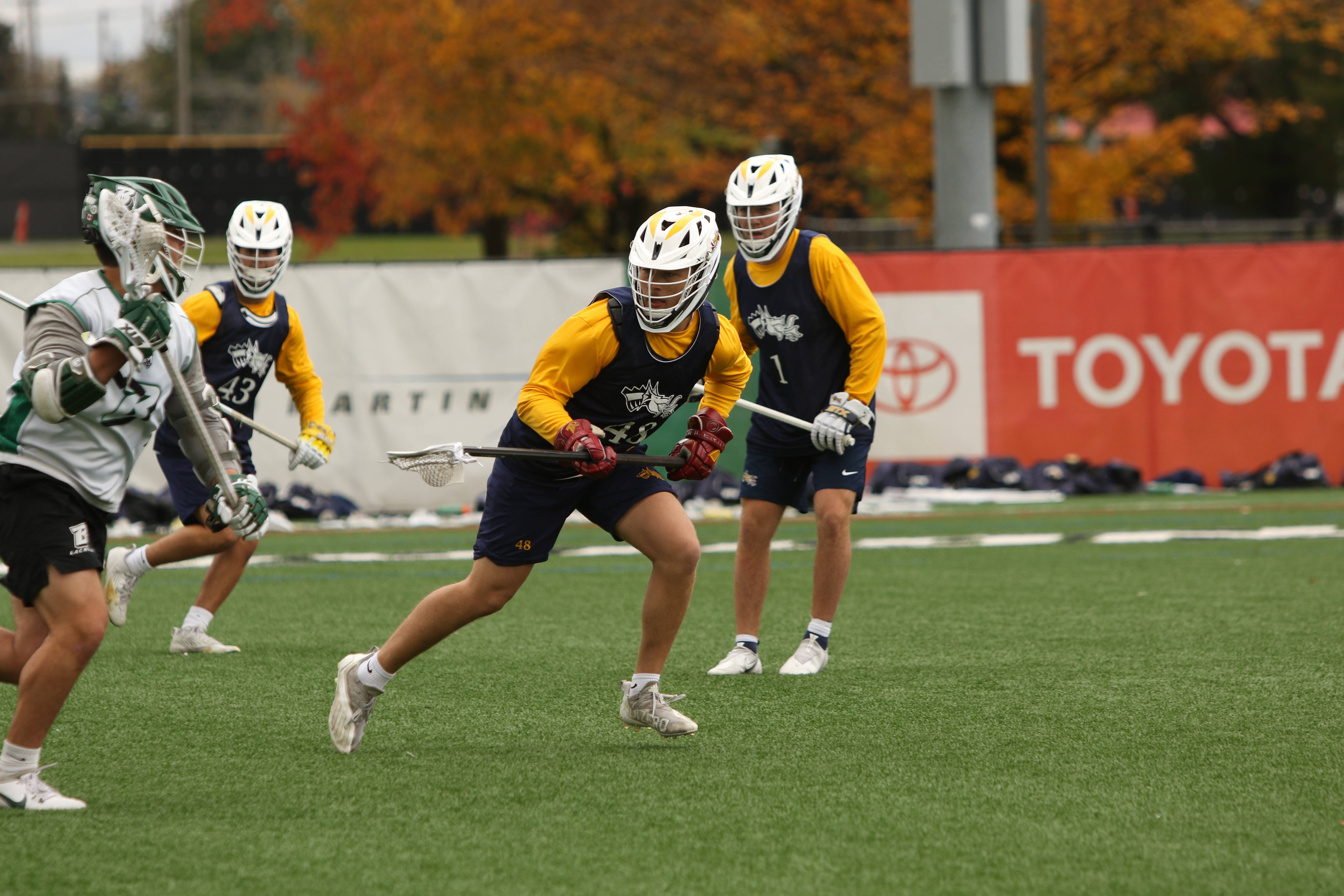 Jackson Bishop playing lacrosse